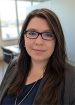 Amy Revious - black jacket and glasses