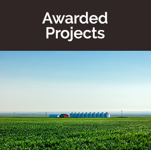 Awarded Projects Tile - Field with Silos and Barn - photo by Todd Klassy