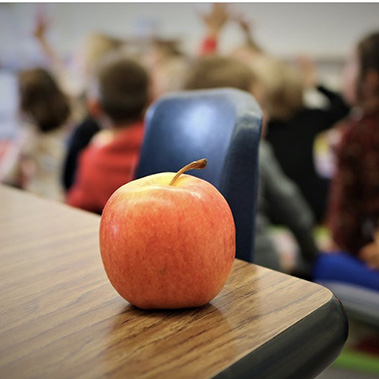 Apple on a desk image