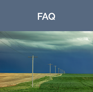 FAQ Tile - Fields with power line down middle and storm clouds