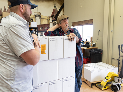 Ken Schultz of Hidden Legend Winery visits with representatives from the MDA