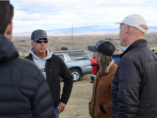 Governor Gianforte and Director Streit listen to Dale Flikkema of Middle Creek Farms