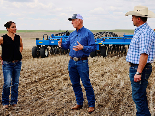 Gov Gianforte visiting with the Toavs on their farm in Wolf Point, Montana